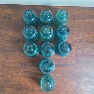 11 Antique Teal Glass Insulators - 10 Hemingray #42 & 1 Lynchburg #38